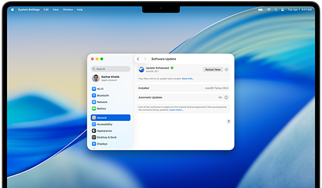 MacBook Pro 16-inch M4 screen shows a scheduled Software Update within System Settings