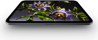 iPad mini, 8.5-inch OLED display, bright and deep blacks, showing a person wearing a hat and jacket