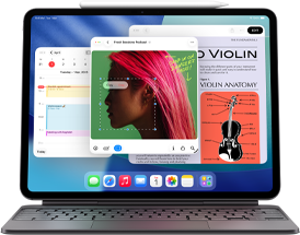 iPad Air displaying Home page with multiple Apple apps, paired with Magic Keyboard and Apple Pencil Pro