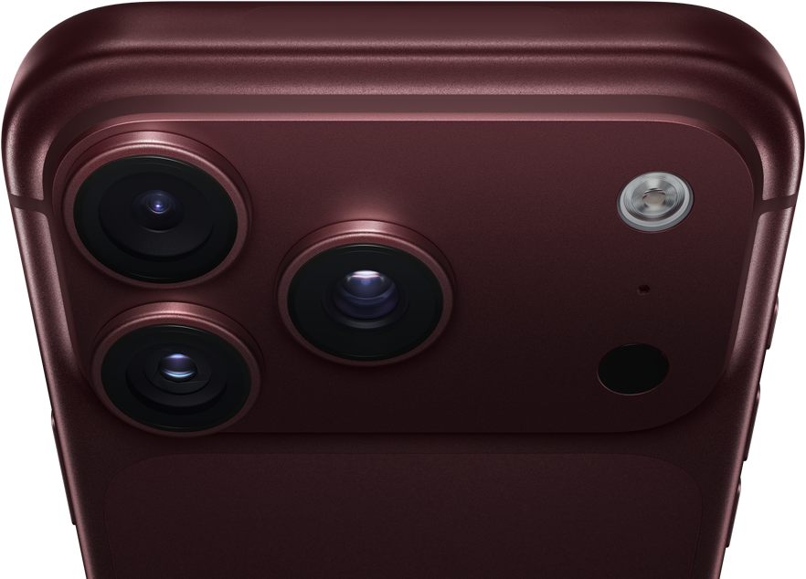 جهاز iPhone 18 Pro Max، بلون عنّابي (أحمر داكن)، الجهة الخارجية الخلفية، نظام كاميرات Pro Fusion في الأعلى، 3 عدسات، شفرات فتحة عدسة متغيرة مغلقة جزئياً، فلاش، ميكروفون وماسح ضوئي بتكنولوجيا لايدار، الجهة الخارجية العلوية، هوائي خلوي، جوانب مسطحة، حواف مدورة
