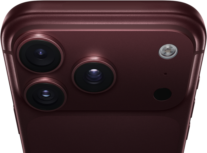 iPhone 18 Pro Max, burgundy color (dark red), back exterior, Pro Fusion camera system at top, 3 lenses, variable aperture blades partially closed, flash, microphone and LiDAR Scanner, top exterior, cellular antenna, flat sides, rounded edges