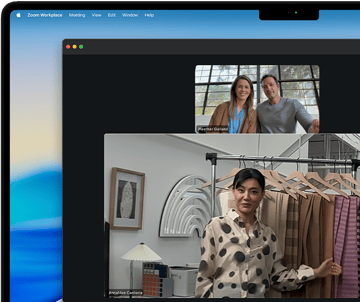 A video call on a MacBook Pro where a woman shows fabrics to two people on the call, with Center Stage keeping her centered in the frame as she moves around