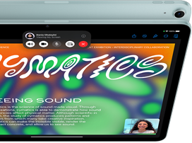 iPad Air, with 12MP Center Stage camera showing a user on FaceTime, in front of another iPad Air model showing the back exterior and camera