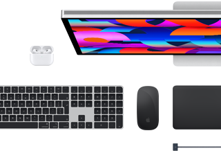 Mac accessories: AirPods, Studio Display, Magic Keyboard, Magic Mouse, Magic Trackpad, MagSafe charge cable in Midnight color